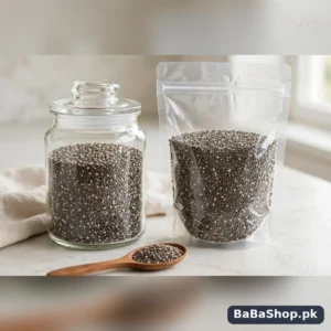 Chia seeds in a clear stand-up pouch and glass jar with a wooden spoon of speckled chia seeds
